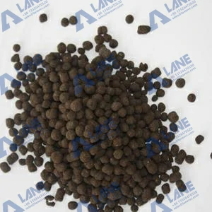 Comparison of raw organic powder next to uniform, spherical fertilizer pellets made by a Stirring Pin Granulator.